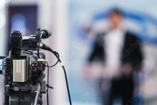 Cameraman recording  press conference