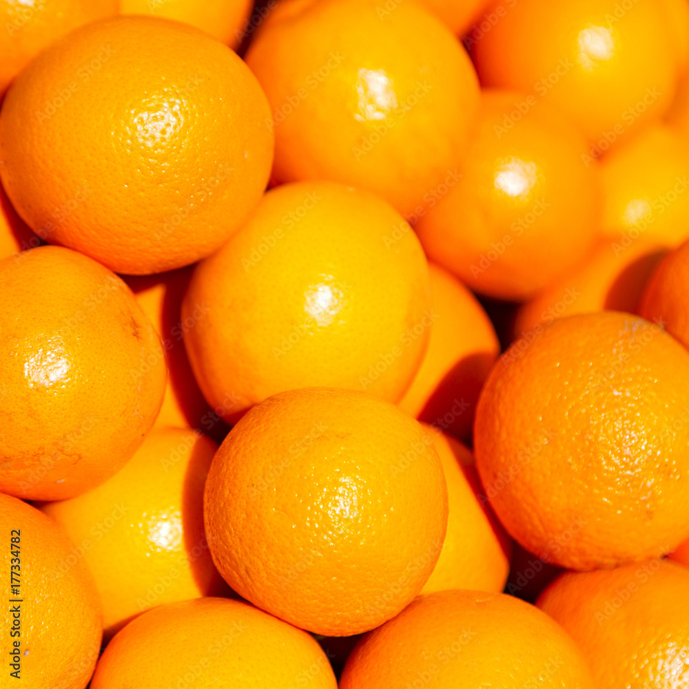 in the market lots of fresh orange in the market lots of fresh orange