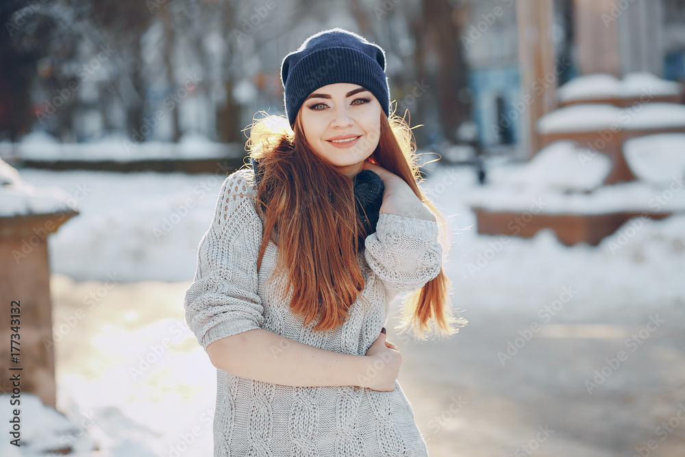 girl walking in a winter city girl walking in a winter city