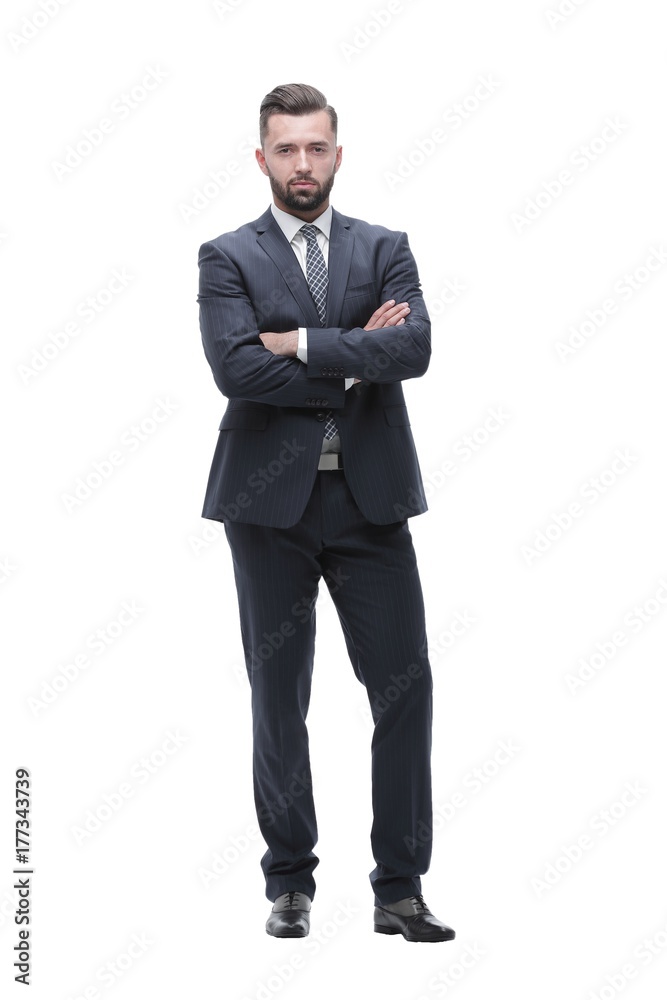 in full growth. businessman arms folded in full growth. businessman arms folded