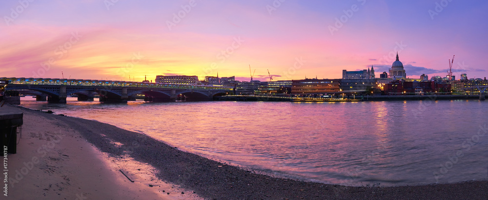 Panoramic view of Thames river on a sunset in London, UK