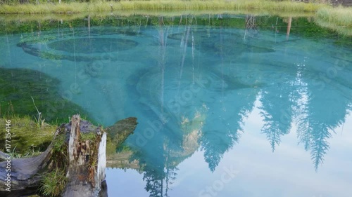 Amazing blue geyser lake in the mountains of Altai, Russia.