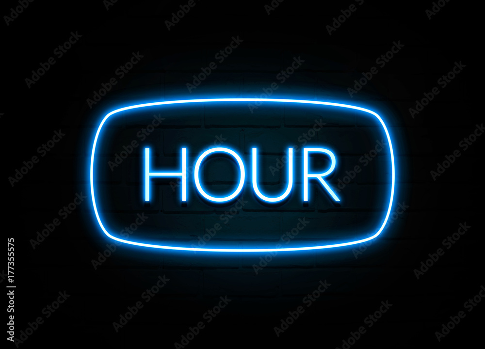 Hour - colorful Neon Sign on brickwall Hour - colorful Neon Sign on brickwall