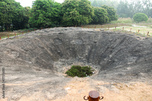 The bomb crater at A1 Hill, Dien Bien Phu, VIETNAM, which was an important position during the Battle of Dien Bien Phu photo