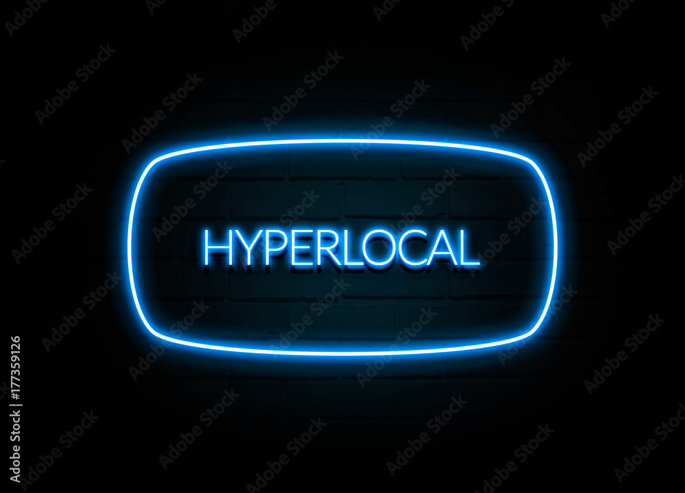 Hyperlocal - colorful Neon Sign on brickwall Hyperlocal - colorful Neon Sign on brickwall