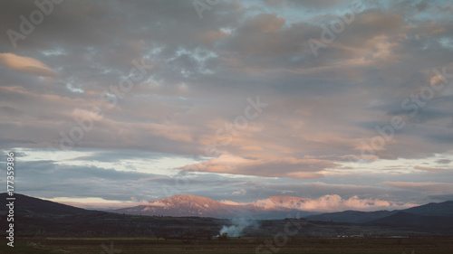 Countryside landscape with cloudy sky