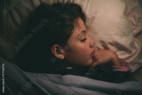 Overhead: Little girl sleeping photo