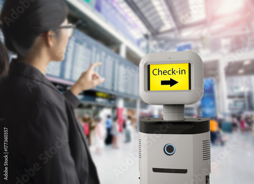assistant robot in airport photo