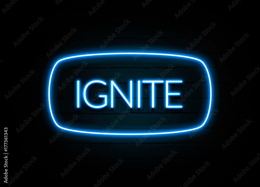 Ignite - colorful Neon Sign on brickwall Ignite - colorful Neon Sign on brickwall
