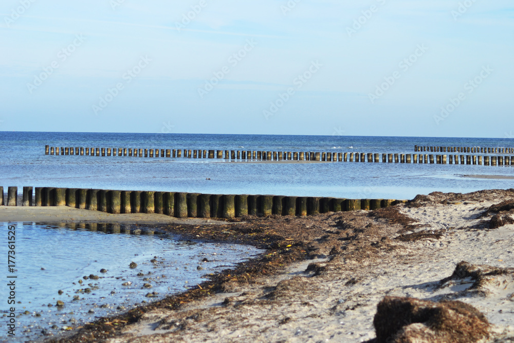 Shot of wooden groins on the island Poel, Baltic Sea, Germany