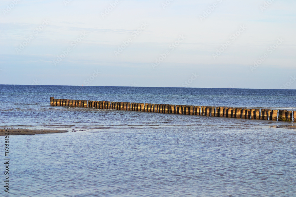 Shot of wooden groins on the island Poel, Baltic Sea, Germany