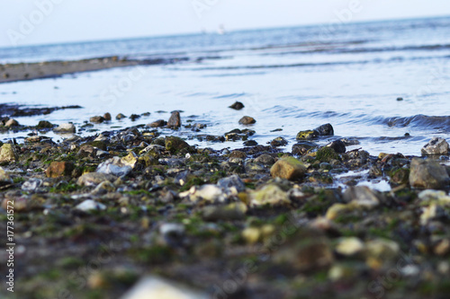 Close up of stone beach and waves on the island Poel in late autumn, Baltic Sea, Germany