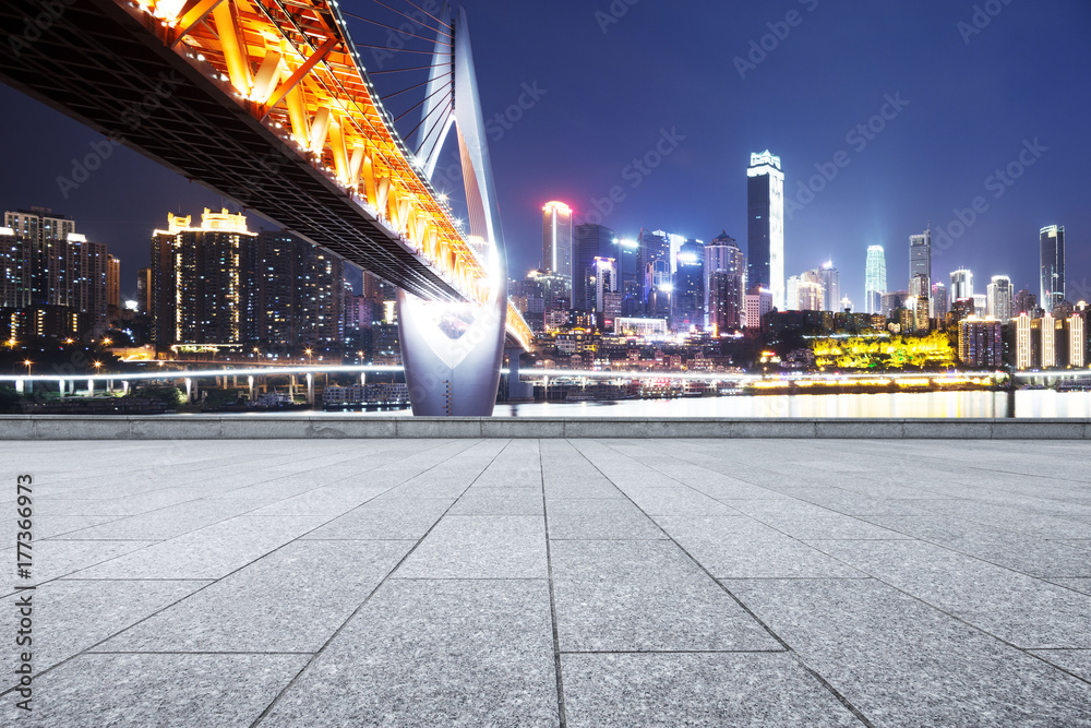 Fototapeta premium empty marble floor with modern bridge and modern city