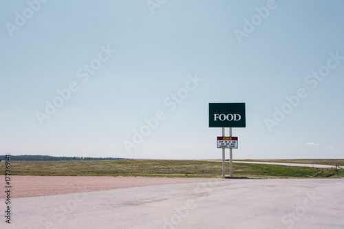 Malplaced large commercial sign saying 