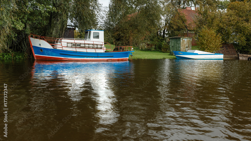 Two old boats in the small port.