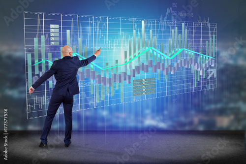Businessman in front of a wall with 3d render Stock exchange trading