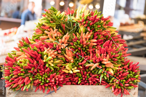 Chilli peppers in a box at market