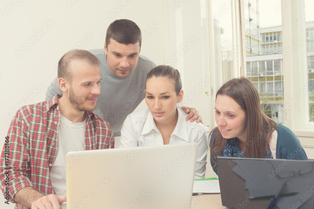 Group of young ordinary people working in the office. Group of young ordinary people working in the office.