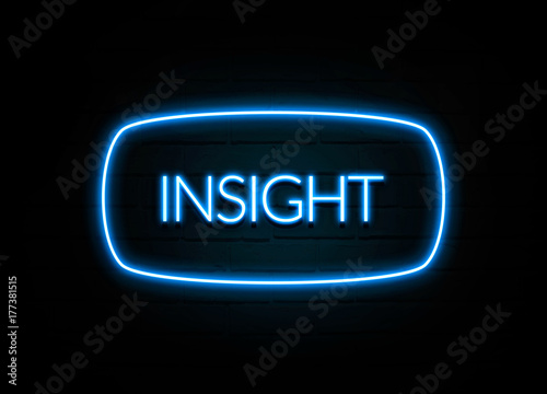 Insight - colorful Neon Sign on brickwall