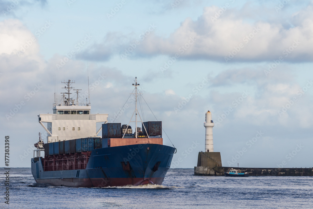 Cargo Ship Arriving at Port