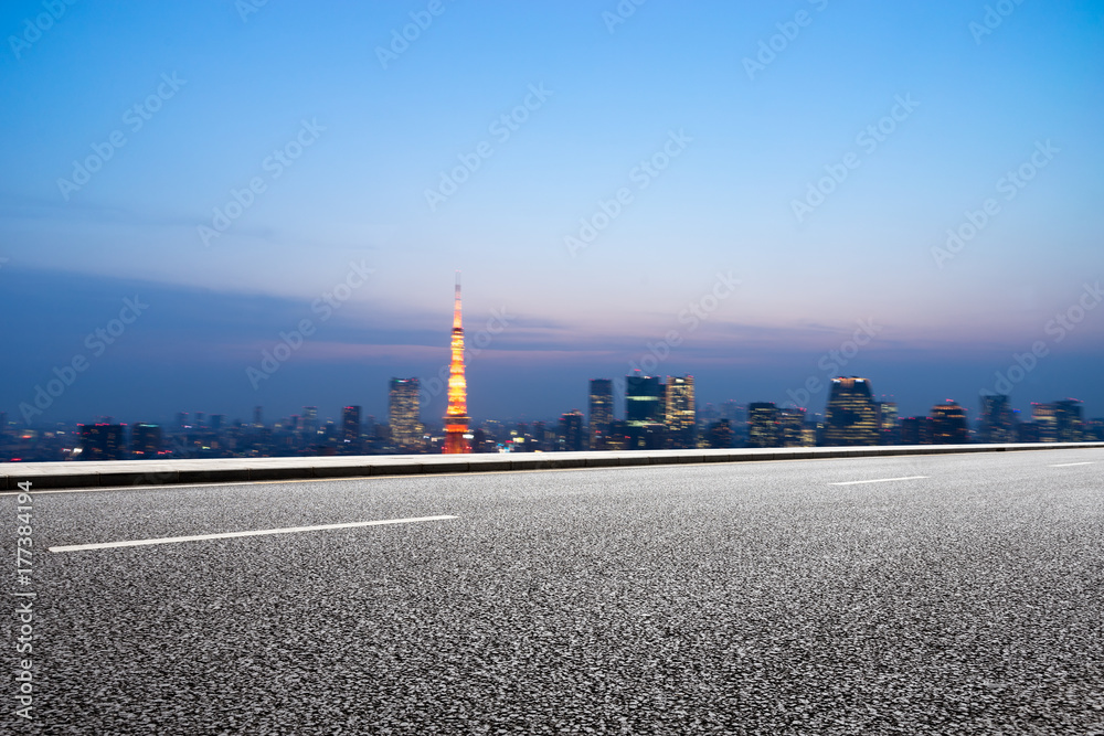 empty asphalt road with cityscape of modern city