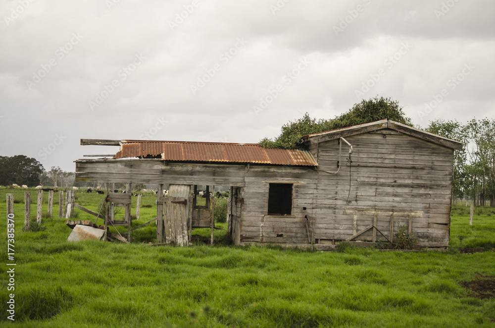 Deserted old wooden farm house