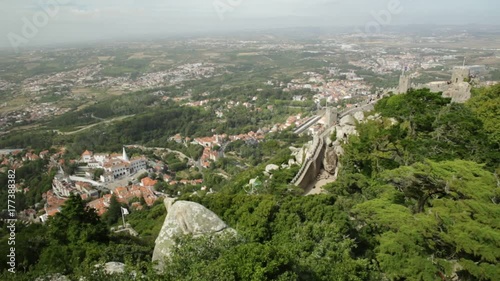Aerial view of scenic National Palace of Sintra or Town Palace, in Portuguese Palacio Nacional de Sintra, with two white famous chimneys rising out of palace. Sintra, Portugal. Unesco Heritage Site