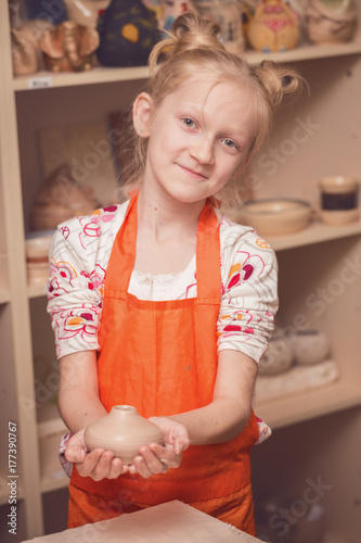 girl in a pottery workshop