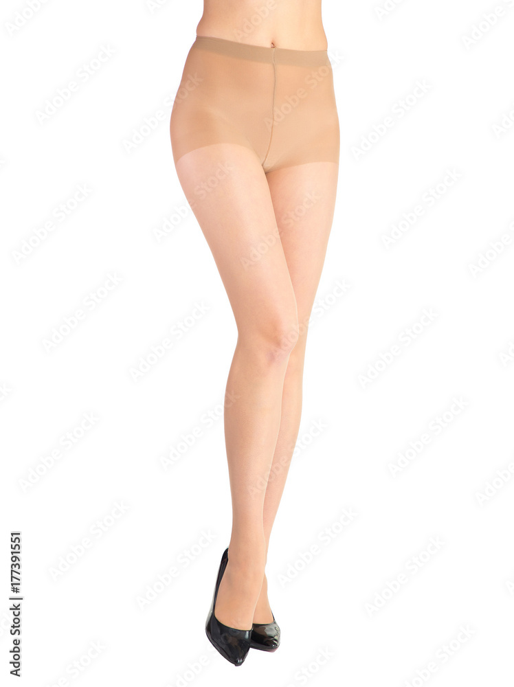 Shapely female legs dressed in tights body color Shapely female legs dressed in tights body color