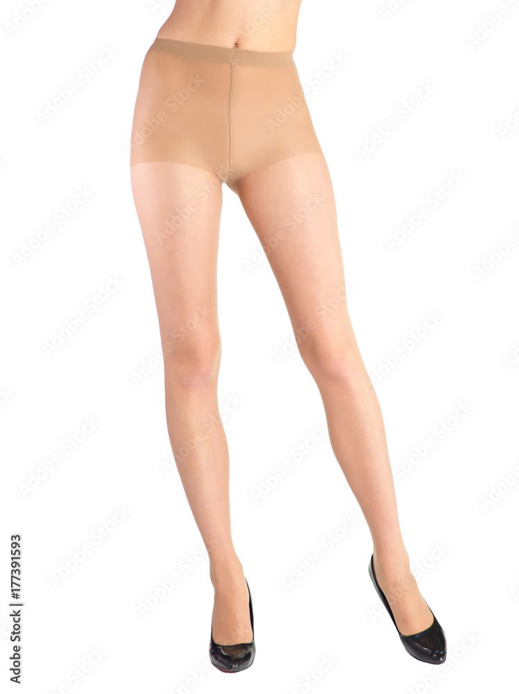 Shapely female legs dressed in tights body color Shapely female legs dressed in tights body color