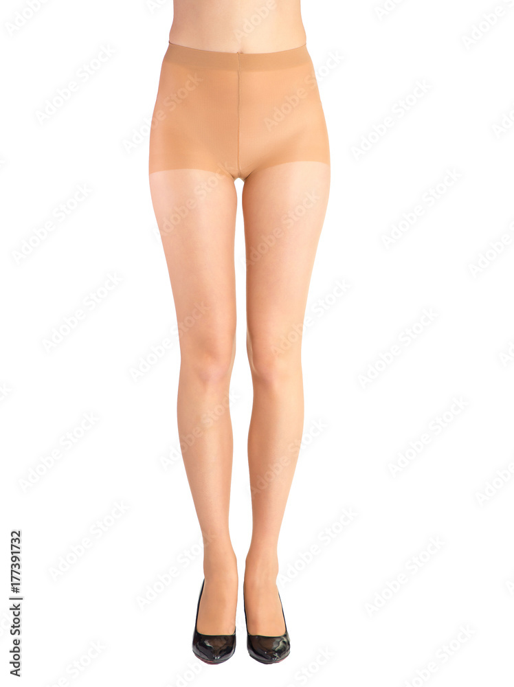 Shapely female legs dressed in tights body color Shapely female legs dressed in tights body color