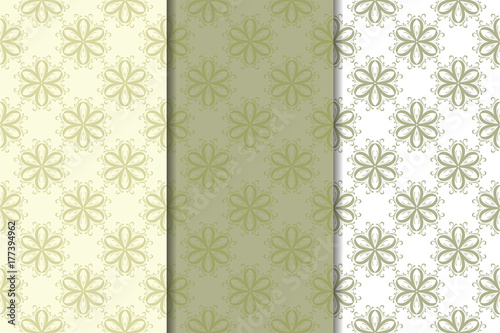 Olive green set of floral ornaments. Seamless patterns