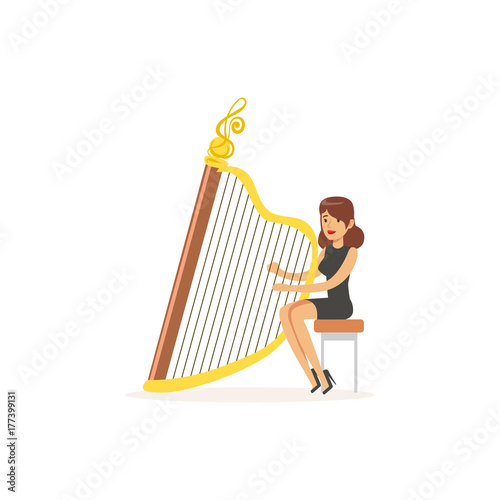 Girl harpist performing musical composition