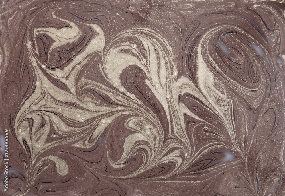 Liquid gold marbled pattern. Beige background