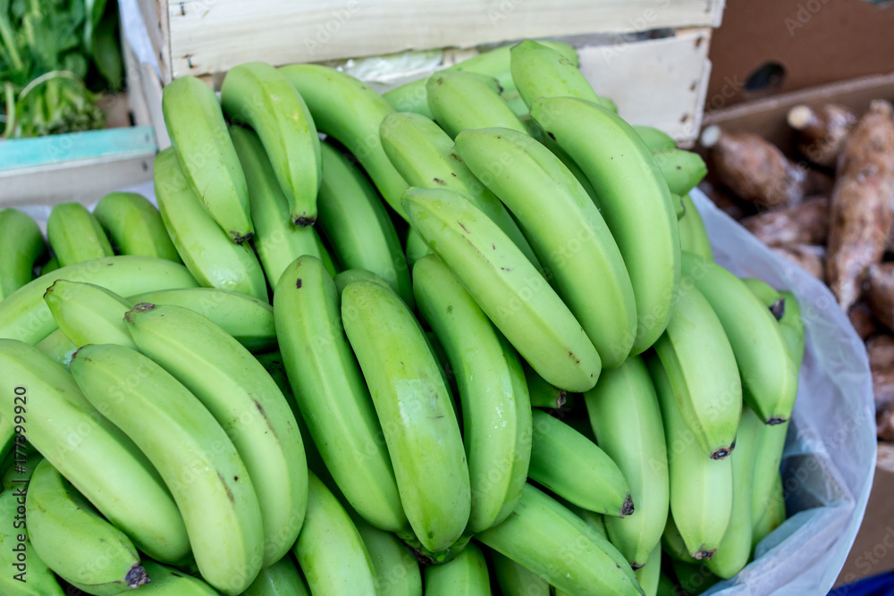 many green bananas. Prepare for sale in fruit market. Thailand