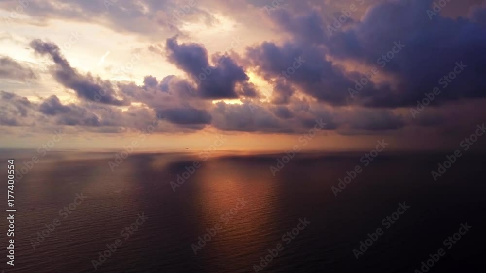 Cloudscape Bronze Sunset on the Sea. Clouds on the sky. Natural color. Sea Horizon AERIAL 4K footage. Cloudscape Bronze Sunset on the Sea. Clouds on the sky. Natural color. Sea Horizon AERIAL 4K footage.