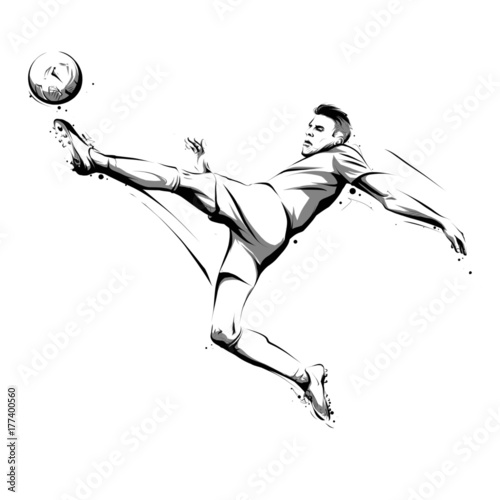 soccer player kicking ball in air