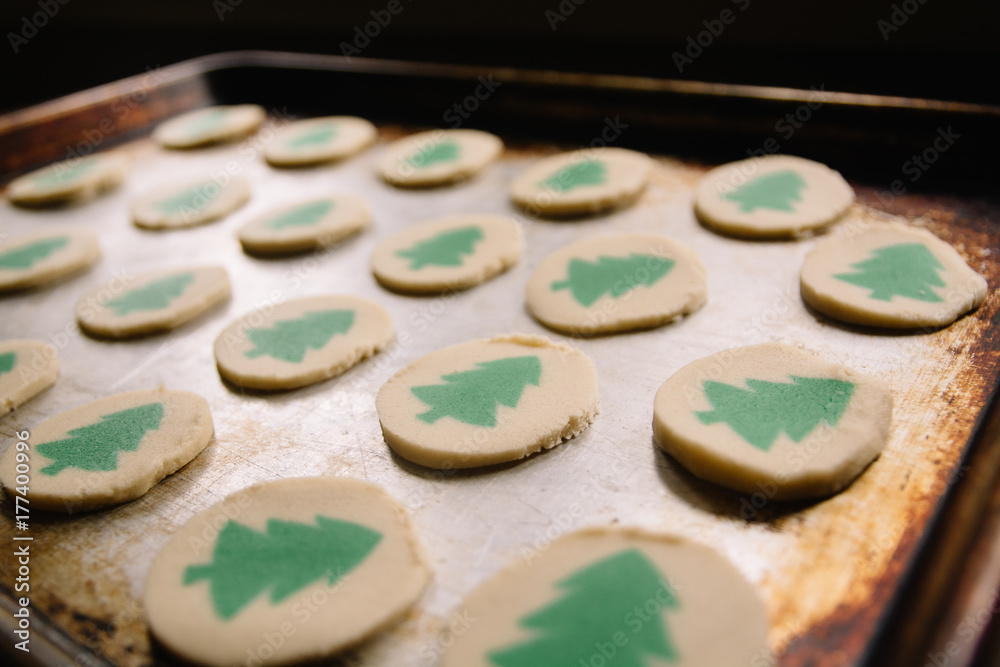 Christmas tree cookies in a baking tray Christmas tree cookies in a baking tray