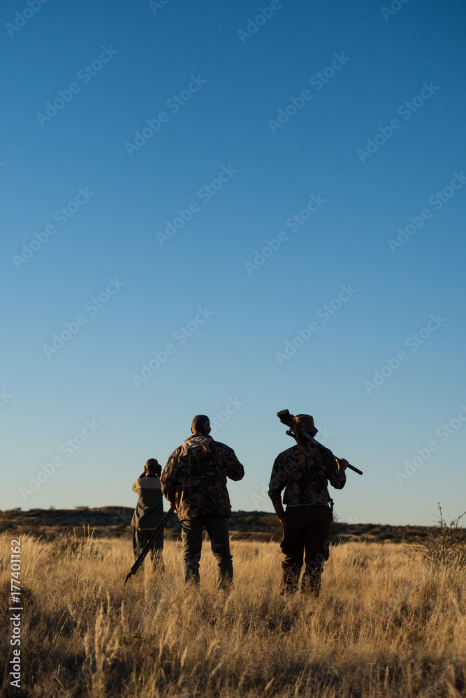 Image of hunters looking for prey to hunt in the karoo on a sunny day Image of hunters looking for prey to hunt in the karoo on a sunny day