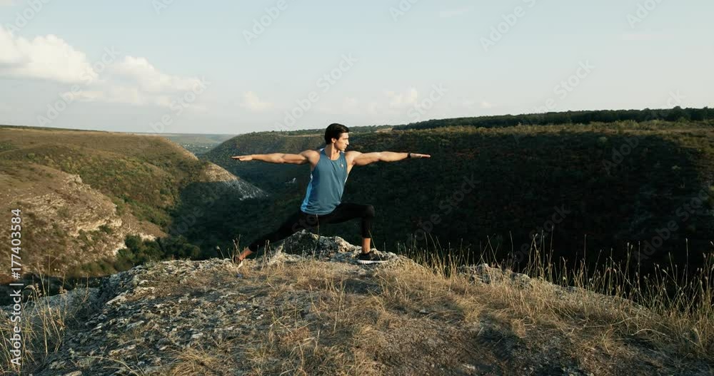 Man Practice Yoga at Sunrise. Beautiful Action in Real Time. Man Practice Yoga at Sunrise. Beautiful Action in Real Time.