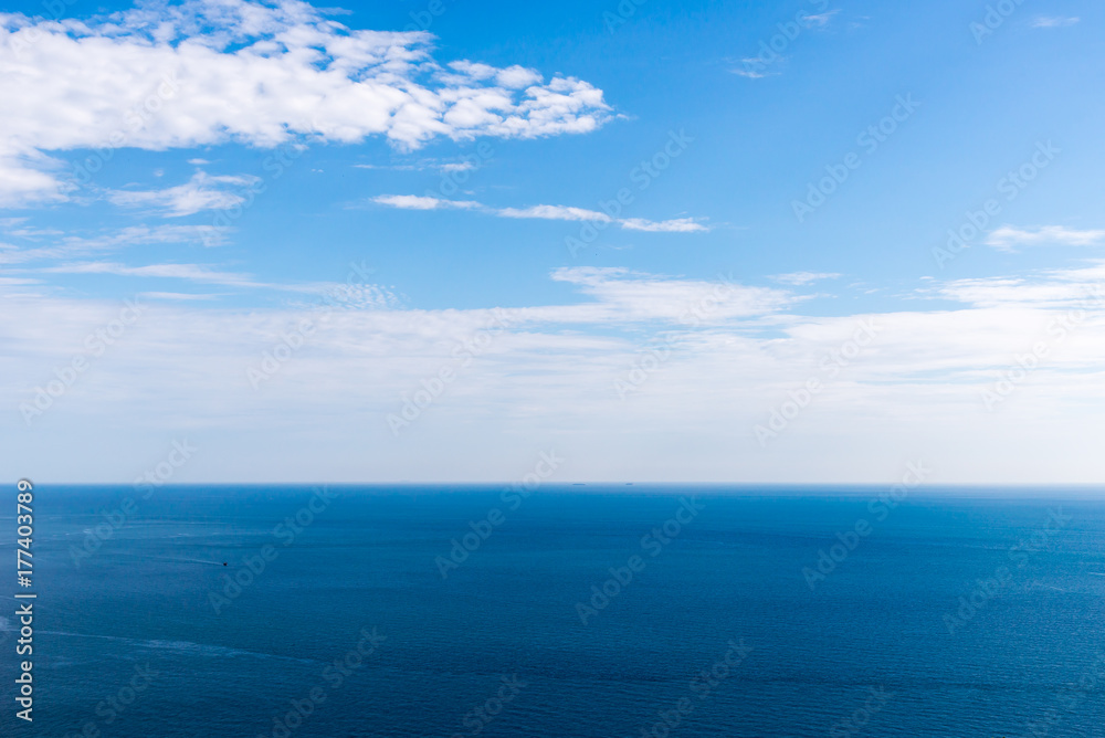 Obraz premium Beautiful sea Landscape with blue sky and tiny clouds on sunny day,Thailand.