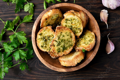 Toasted bread with cheese and greens photo