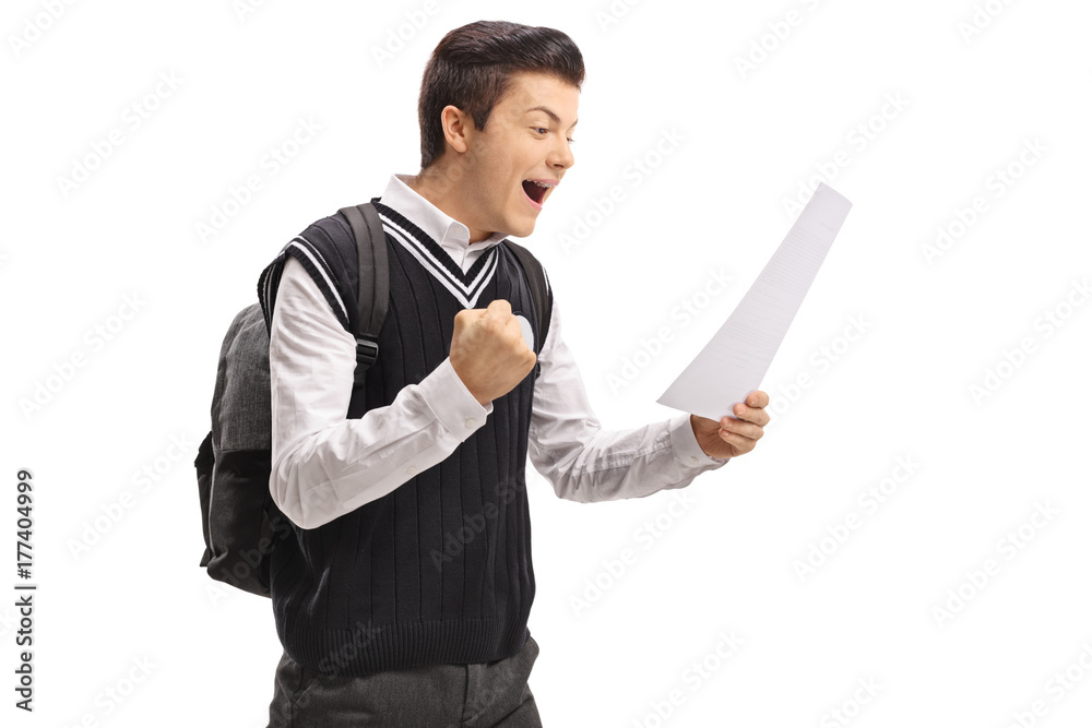 Teenage student looking at an exam and gesturing happiness Teenage student looking at an exam and gesturing happiness