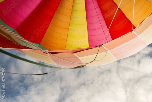 looking up at a hot air balloon canopy photo