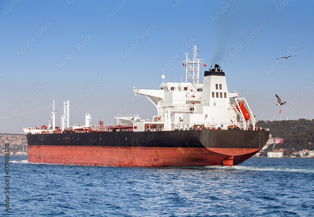 Stern of a large tanker cargo ship on route to Bosporus strait in Black sea. Turkish water transport concept