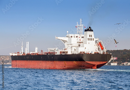 Stern of a large tanker cargo ship on route to Bosporus strait in Black sea. Turkish water transport concept