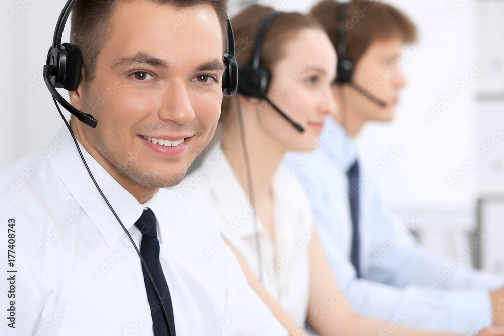 Young business man in headset. Call center Young business man in headset. Call center