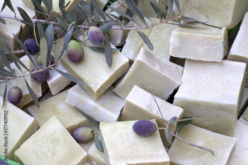 Natural olive soap and olives.