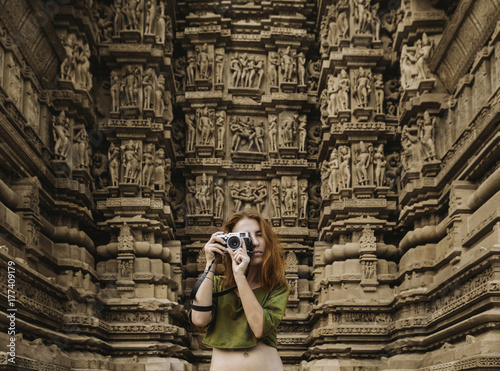 Woman Taking Photos At Kamasutra Temple photo
