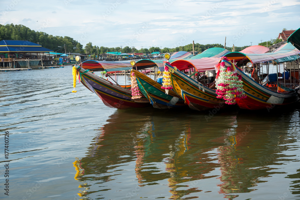 the beautiful landscape with boats and reflection in the sea at Bang Chan, Ban Khlung, Chanthaburi, Thailand the beautiful landscape with boats and reflection in the sea at Bang Chan, Ban Khlung, Chanthaburi, Thailand